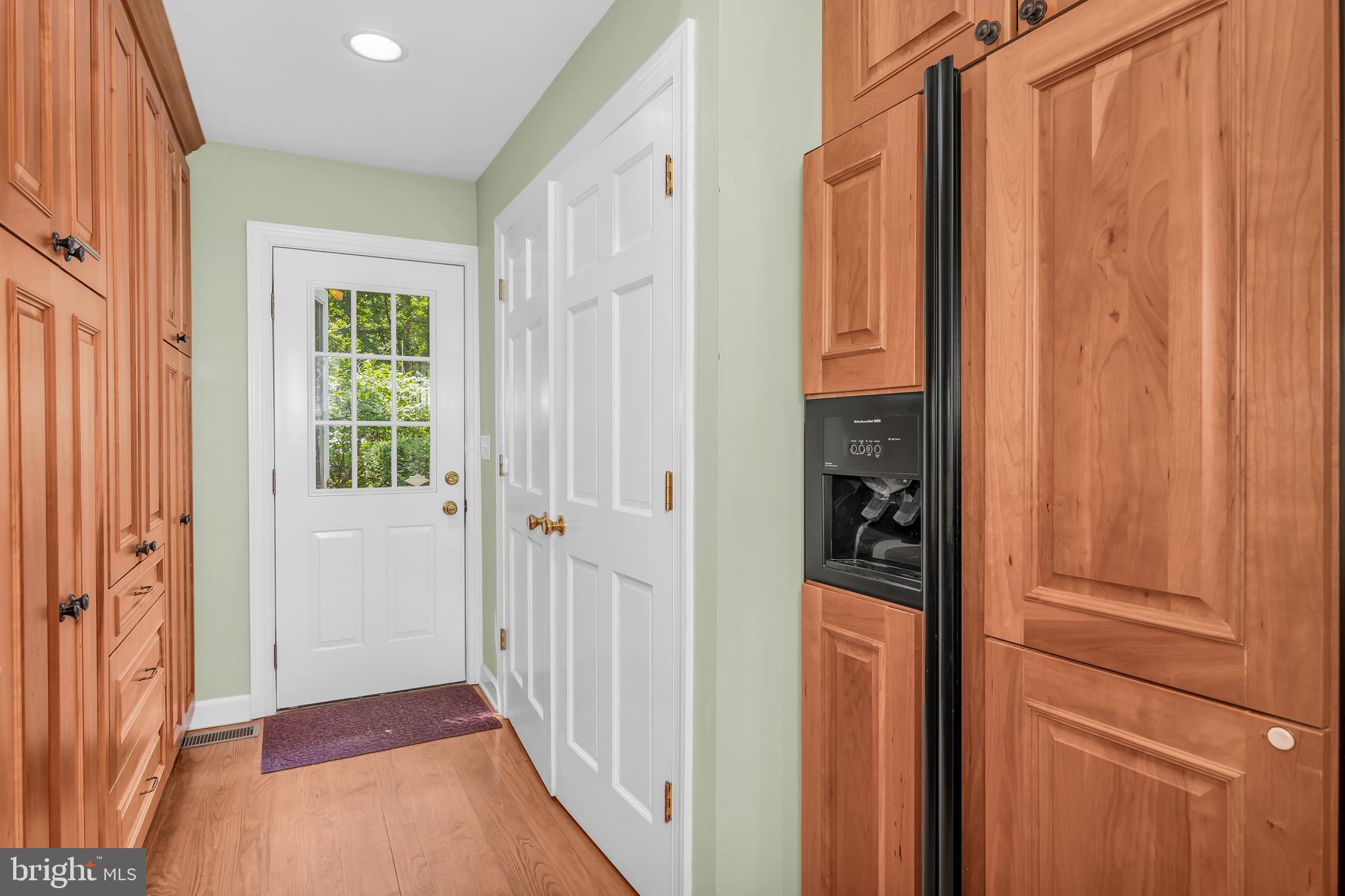 24420 Mallard Place St. Michaels, MD 21663 - Photo 21 of 33 a view of a hallway with wooden floor and staircase