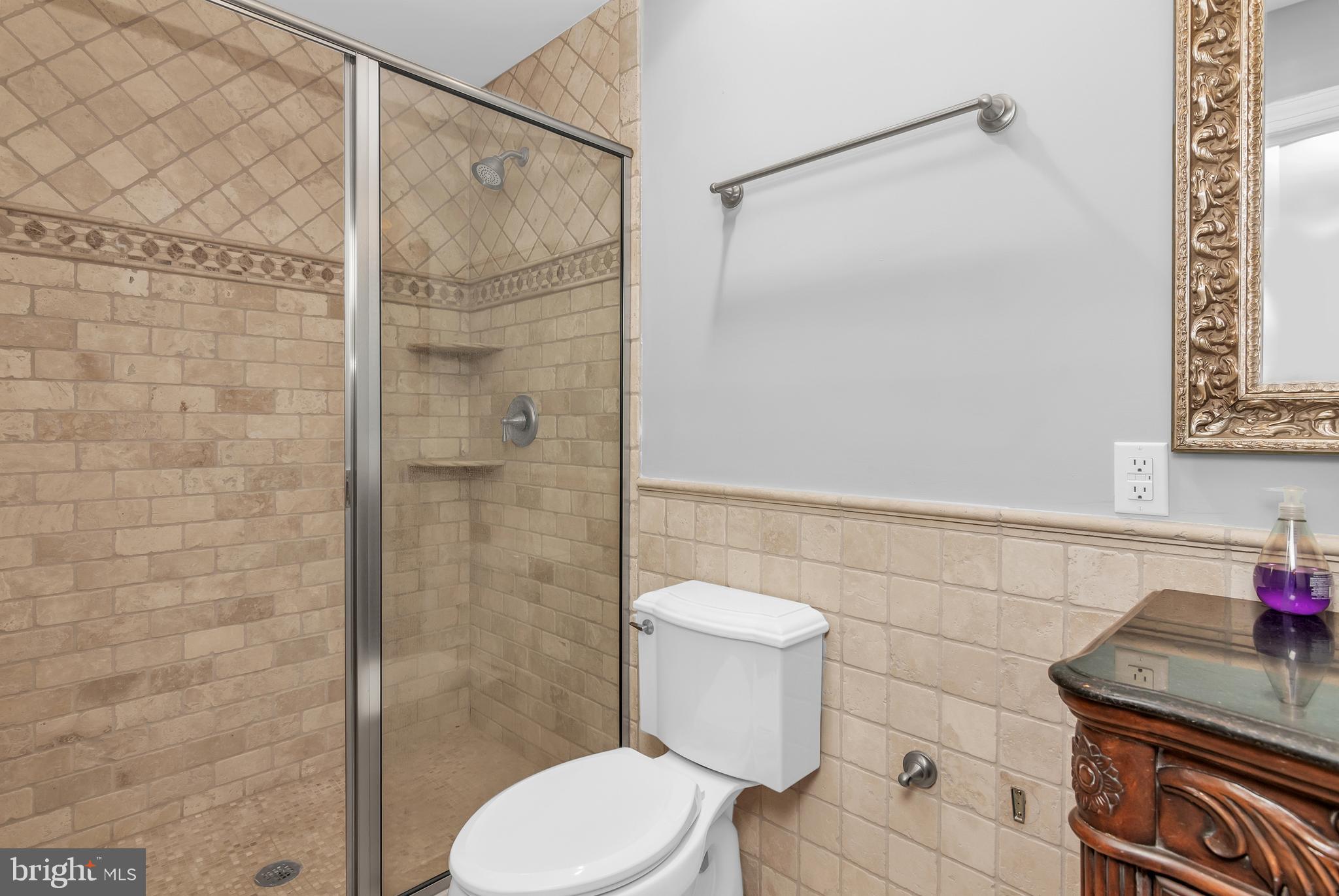 24420 Mallard Place St. Michaels, MD 21663 - Photo 32 of 33 a bathroom with a toilet and shower