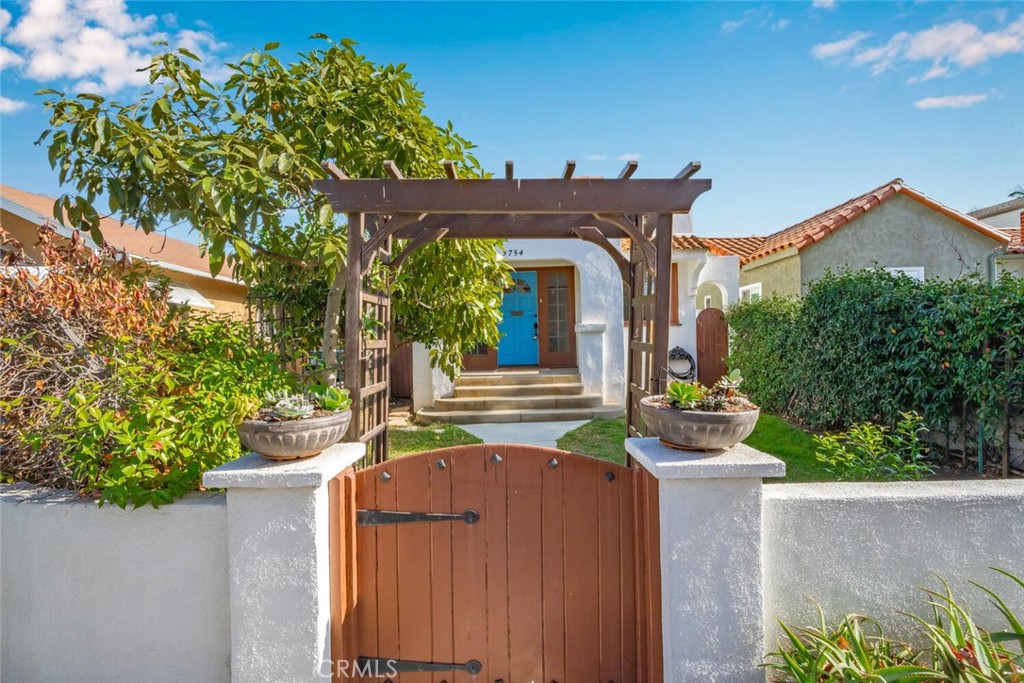 3754 Brayton Avenue Long Beach, CA 90807 - Photo 8 of 33 front view of a house with a yard