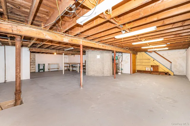 a view of an empty room with a garage