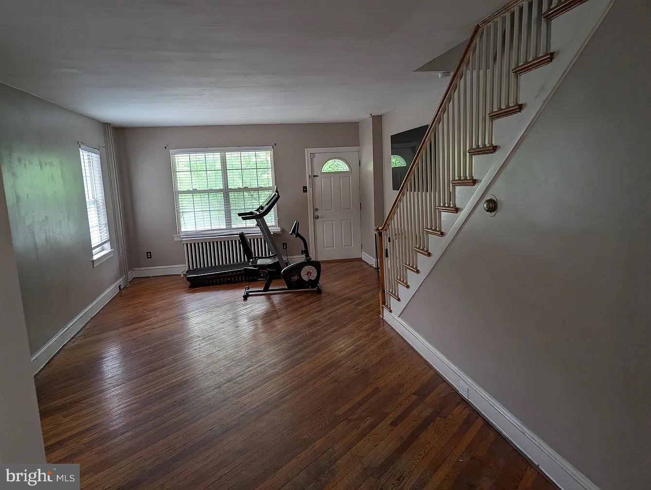 1226 Haycreek Road Birdsboro, PA 19508 - Photo 4 of 16 a view of empty room with wooden floor and fan