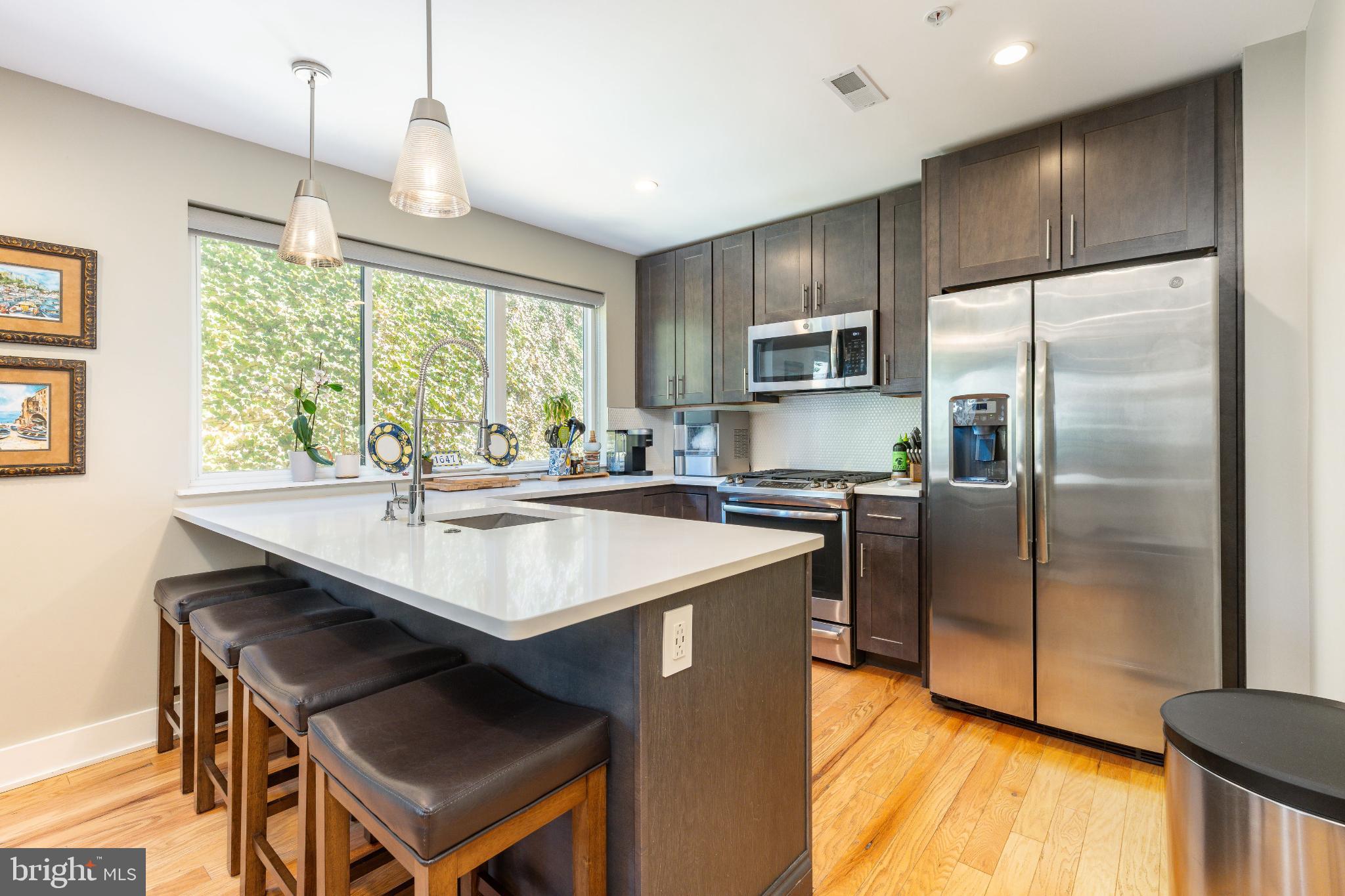 1647 East Eyre Street, Unit 8 Philadelphia, PA 19125 - Photo 2 of 28 Modern kitchen with sleek finishes.