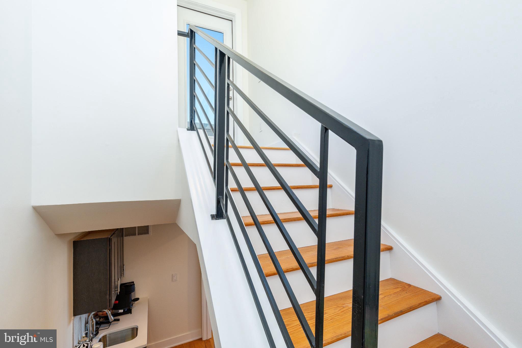 1647 East Eyre Street, Unit 8 Philadelphia, PA 19125 - Photo 22 of 28 Staircase to private rooftop
