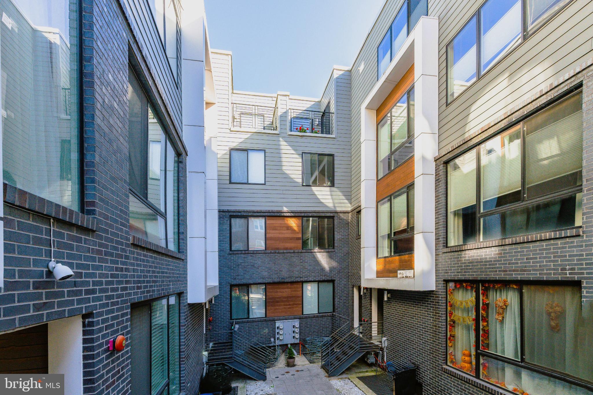 1647 East Eyre Street, Unit 8 Philadelphia, PA 19125 - Photo 26 of 28 View of Unit 8 from the courtyard (top right)