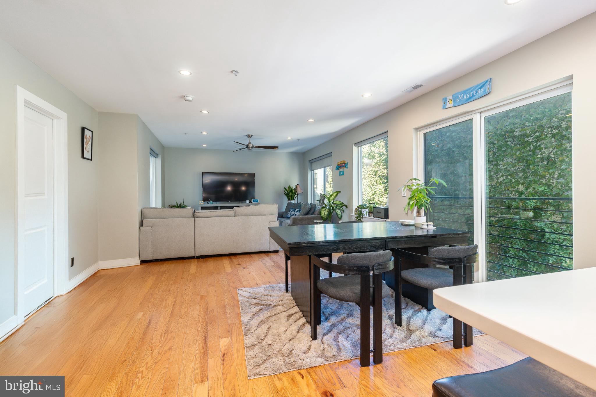 1647 East Eyre Street, Unit 8 Philadelphia, PA 19125 - Photo 6 of 28 Living area with windows on both sides