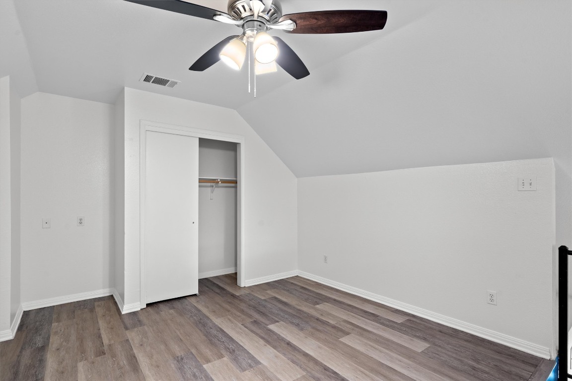 2908 Whisper Oaks Lane, Unit C Georgetown, TX 78628 - Photo 17 of 31 wooden floor in an empty room