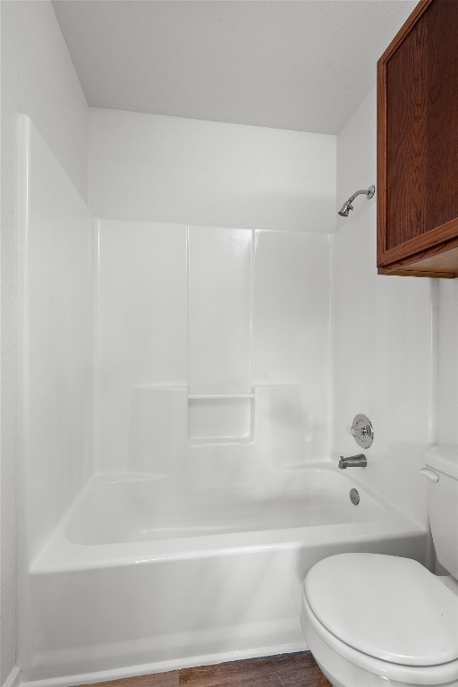 2908 Whisper Oaks Lane, Unit C Georgetown, TX 78628 - Photo 22 of 31 a bathroom with a toilet and bathtub