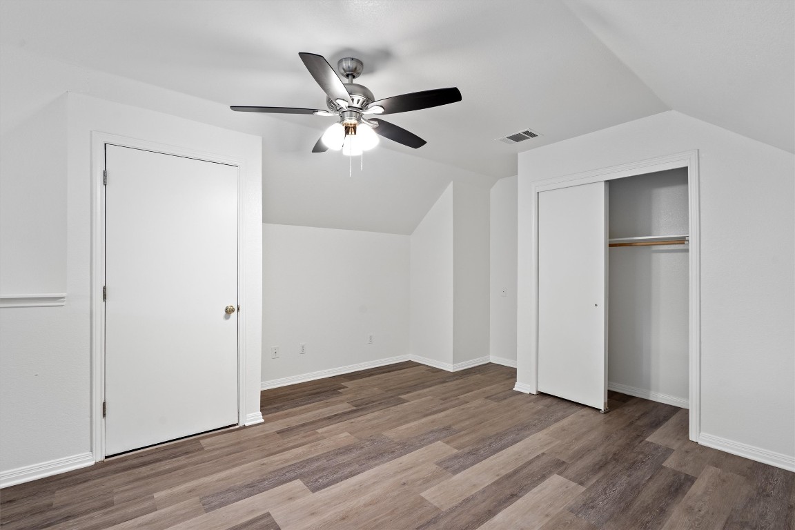 2908 Whisper Oaks Lane, Unit C Georgetown, TX 78628 - Photo 26 of 31 a view of empty room with wooden floor