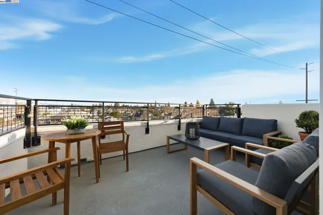 a view of a living room and kitchen