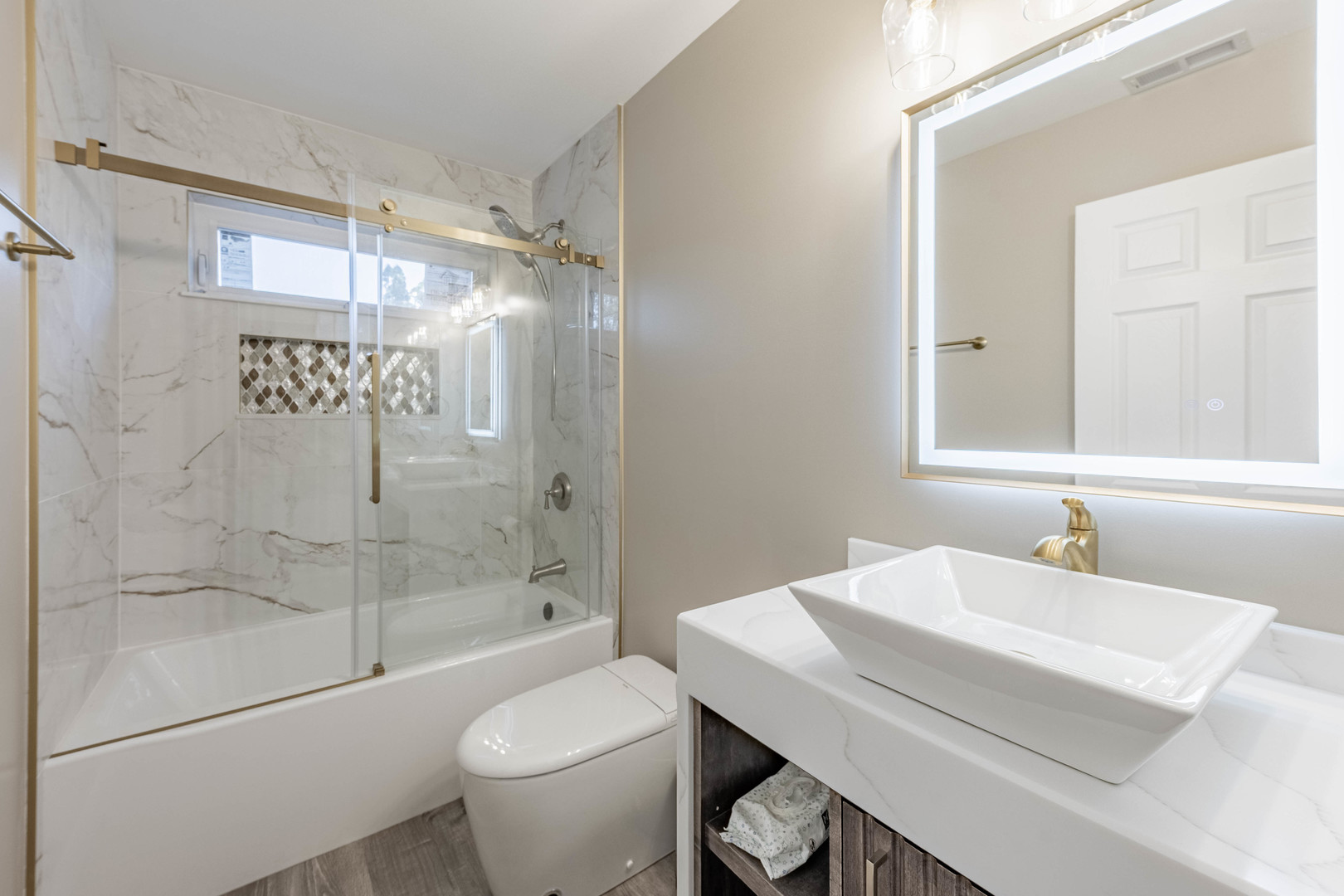 1817 Kelly Avenue Crest Hill, IL 60403 - Photo 13 of 22 a bathroom with a sink a toilet and shower