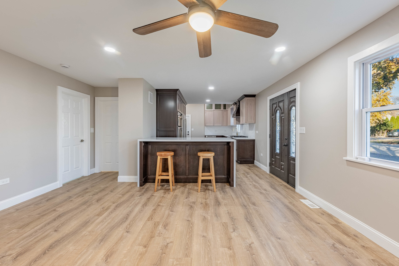 1817 Kelly Avenue Crest Hill, IL 60403 - Photo 5 of 22 a view of kitchen with furniture and a ceiling fan