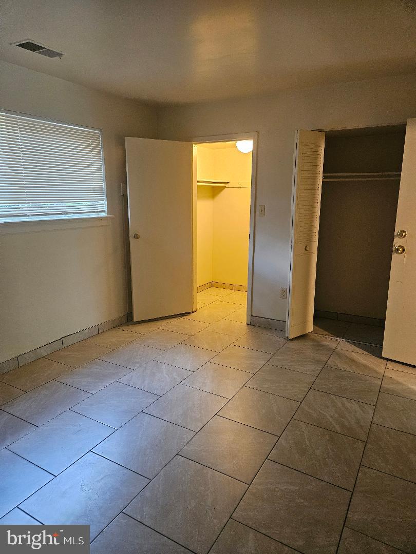 8481 Greenbelt Road, Unit T2 Greenbelt, MD 20770 - Photo 17 of 22 a view of empty room