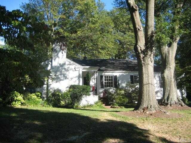 104 Berkshire Road Raleigh, NC 27608 - Photo 1 of 1 a front view of house with yard space and green space