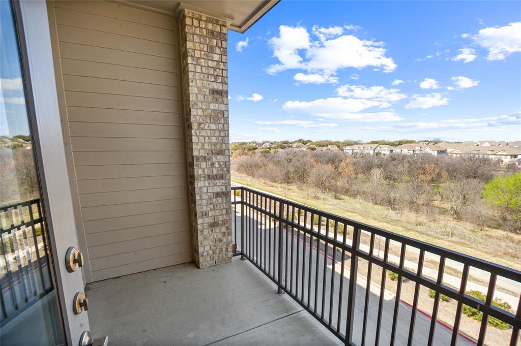 2700 Old Denton Road, Unit 3318 Carrollton, TX 75007 - Photo 11 of 24 Balcony with a Creekview