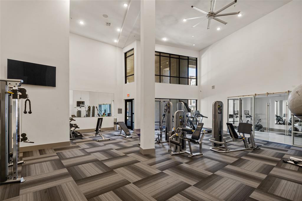 2700 Old Denton Road, Unit 3318 Carrollton, TX 75007 - Photo 19 of 24 Workout area with a high ceiling and recessed lighting