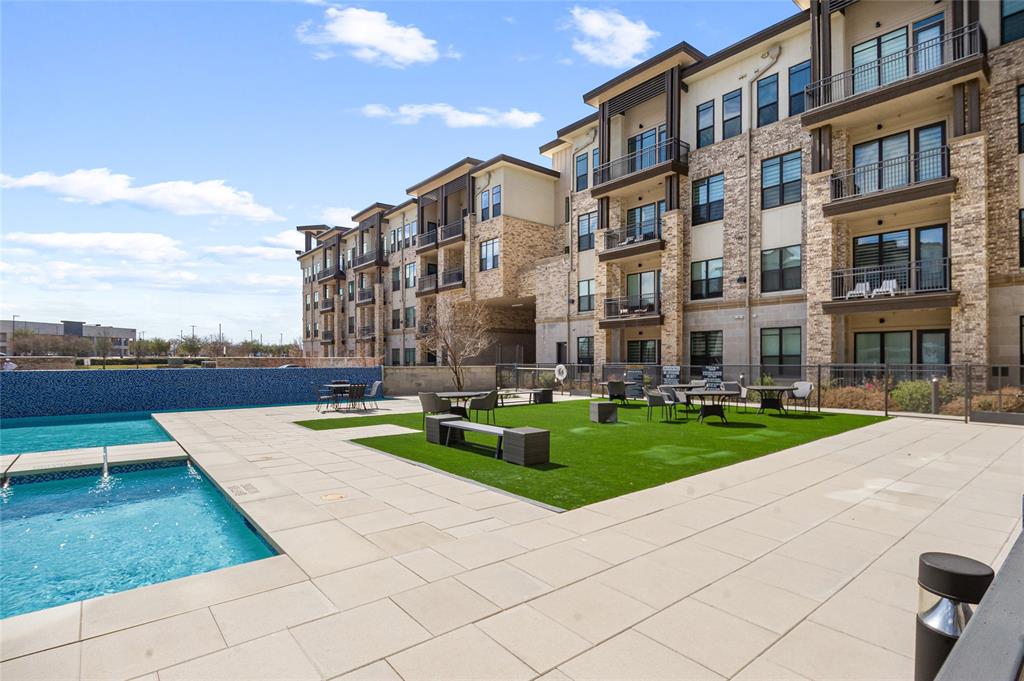 2700 Old Denton Road, Unit 3318 Carrollton, TX 75007 - Photo 20 of 24 Combined pool / hot tub featuring a patio