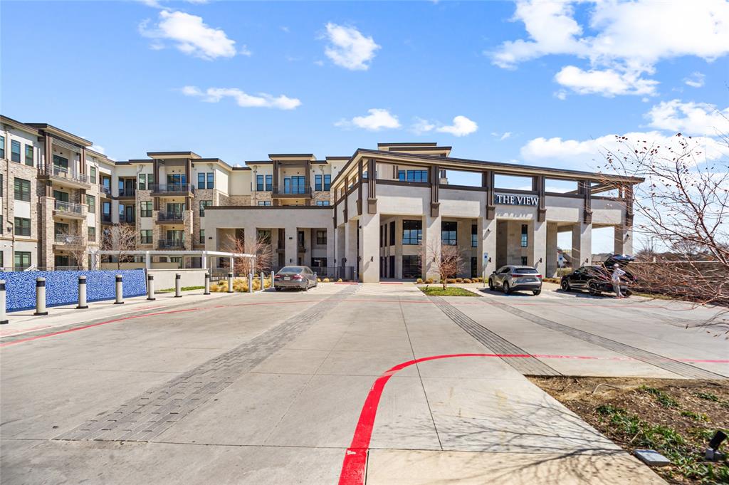 2700 Old Denton Road, Unit 3318 Carrollton, TX 75007 - Photo 23 of 24 View of building exterior-Park here & the clubhouse entrance is right under the sign "The View"
