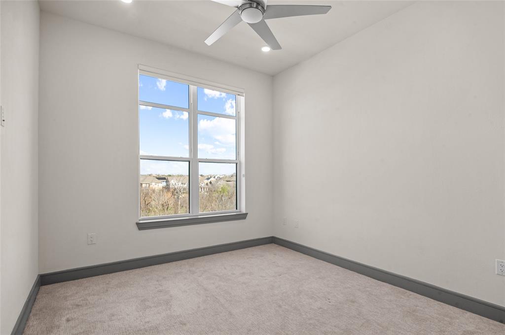 2700 Old Denton Road, Unit 3318 Carrollton, TX 75007 - Photo 9 of 24 Primary Bedroom featuring ceiling fan and recessed lighting