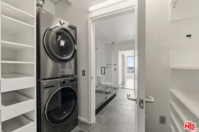 a view of a porch with a wooden bench