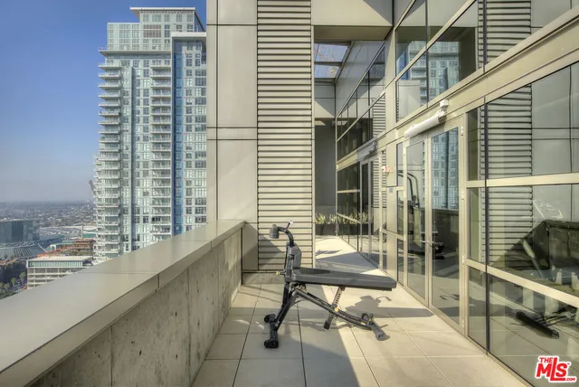 a view of a terrace with sitting area