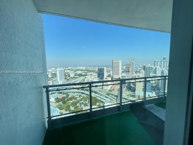 90 Southwest 3rd Street, Unit 4208 Miami, FL 33130 - Photo 7 of 17 a view of a balcony next to a yard
