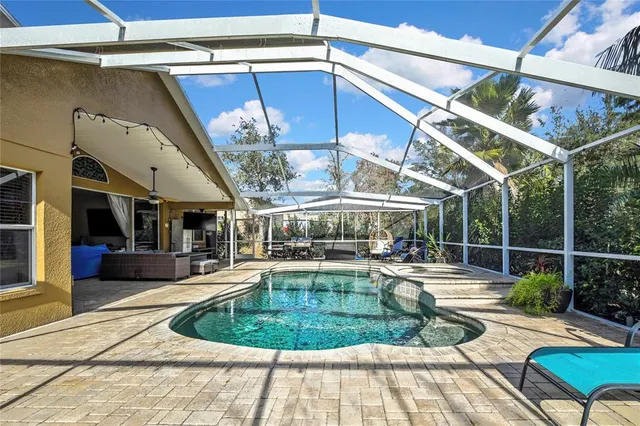 a front view of a house with a yard and a garage