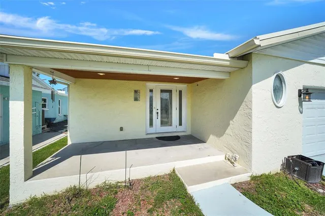 a view of a house with a street