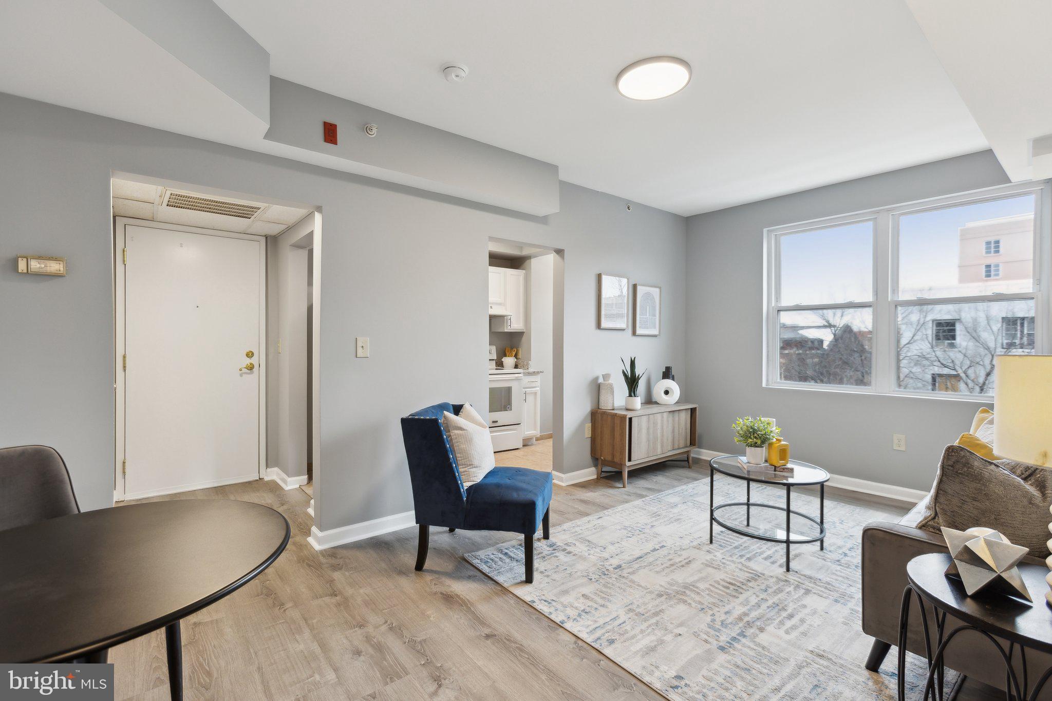 The large unobstructed window in the living room