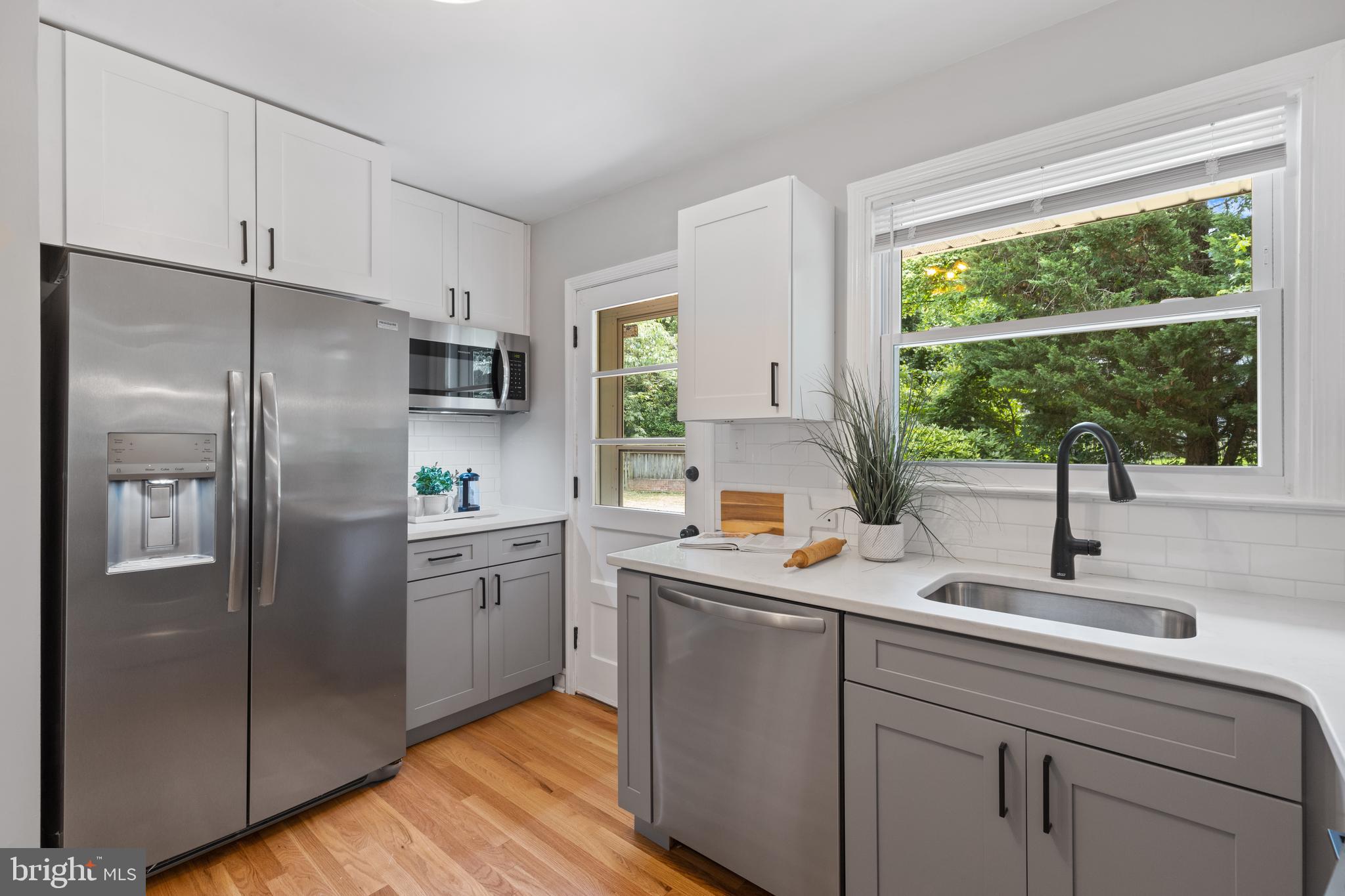 7003 Wardman Road Baltimore, MD 21212 - Photo 15 of 42 a kitchen with appliances cabinets and a sink