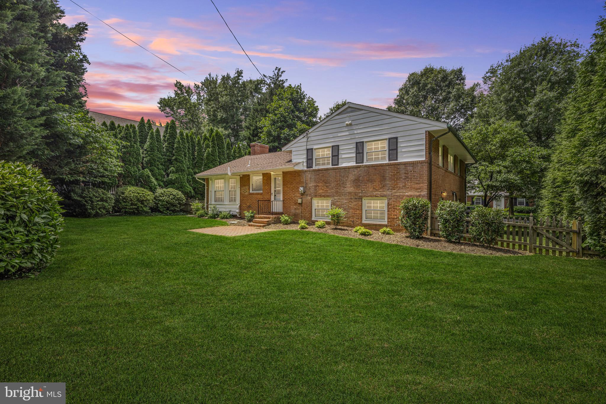 7003 Wardman Road Baltimore, MD 21212 - Photo 41 of 42 a front view of a house with yard and green space