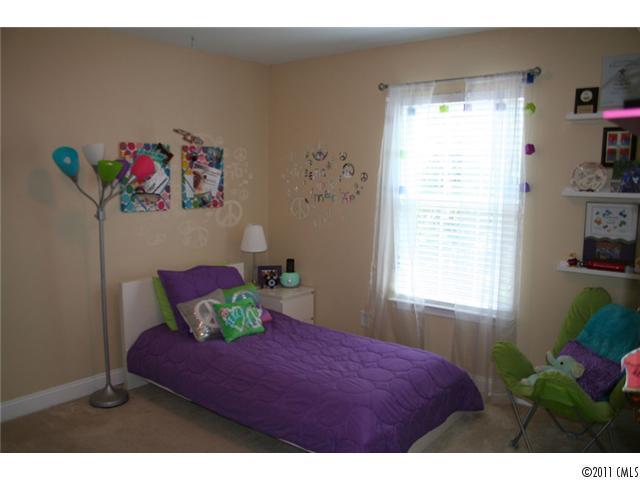 1826 Sam Smith Road, Unit 3 Fort Mill, SC 29708 - Photo 11 of 16 a bedroom with a bed and a window