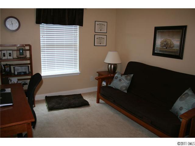 1826 Sam Smith Road, Unit 3 Fort Mill, SC 29708 - Photo 14 of 16 a living room with furniture and a window