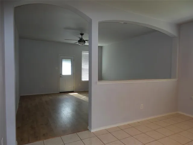 an empty room with windows