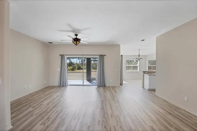 a kitchen with stainless steel appliances a refrigerator and a stove