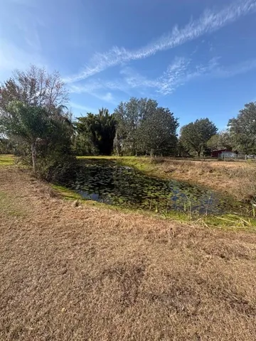a view of a lake with outdoor space