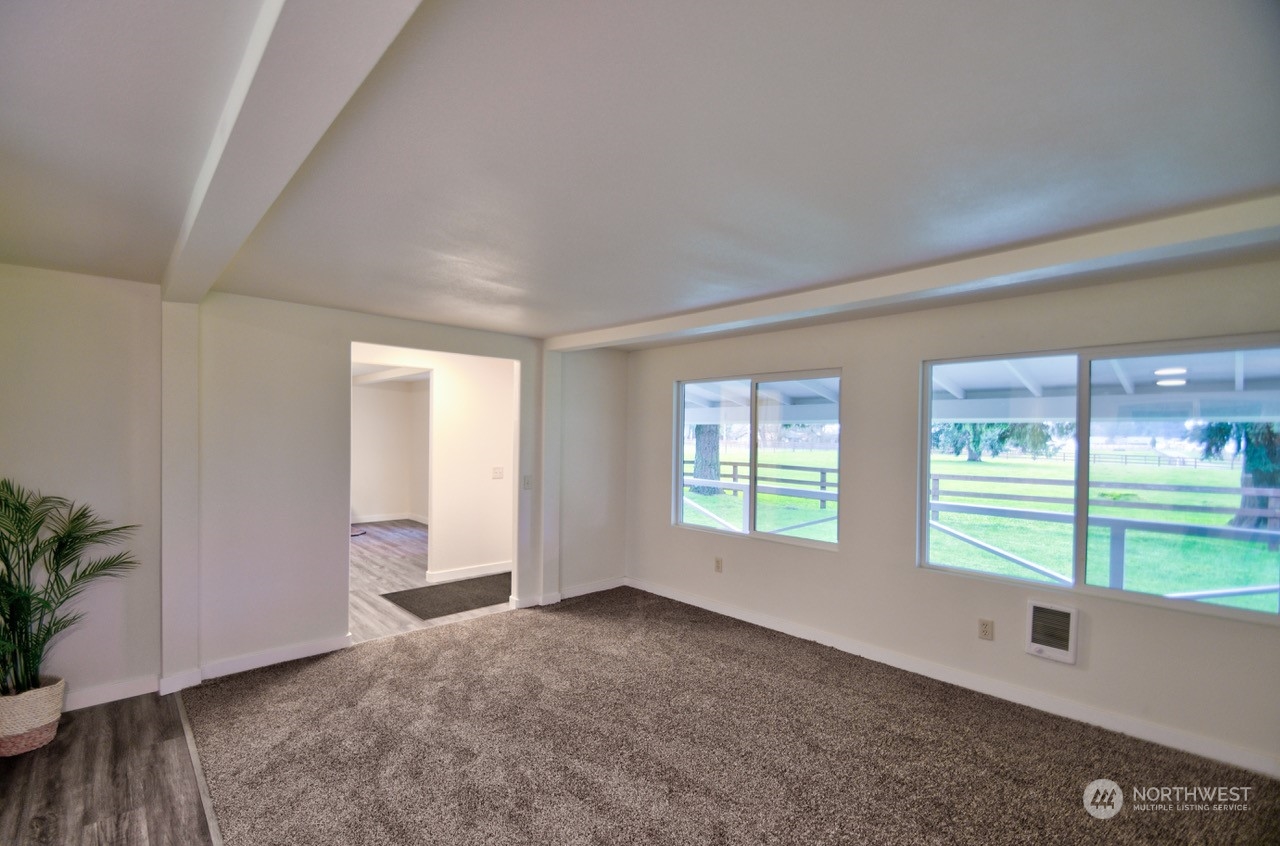 20020 Carper Road Southwest Rochester, WA 98579 - Photo 11 of 35 an empty room with windows