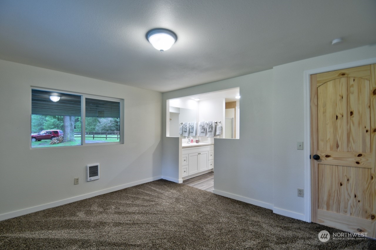 20020 Carper Road Southwest Rochester, WA 98579 - Photo 15 of 35 an entryway at an empty room with a window