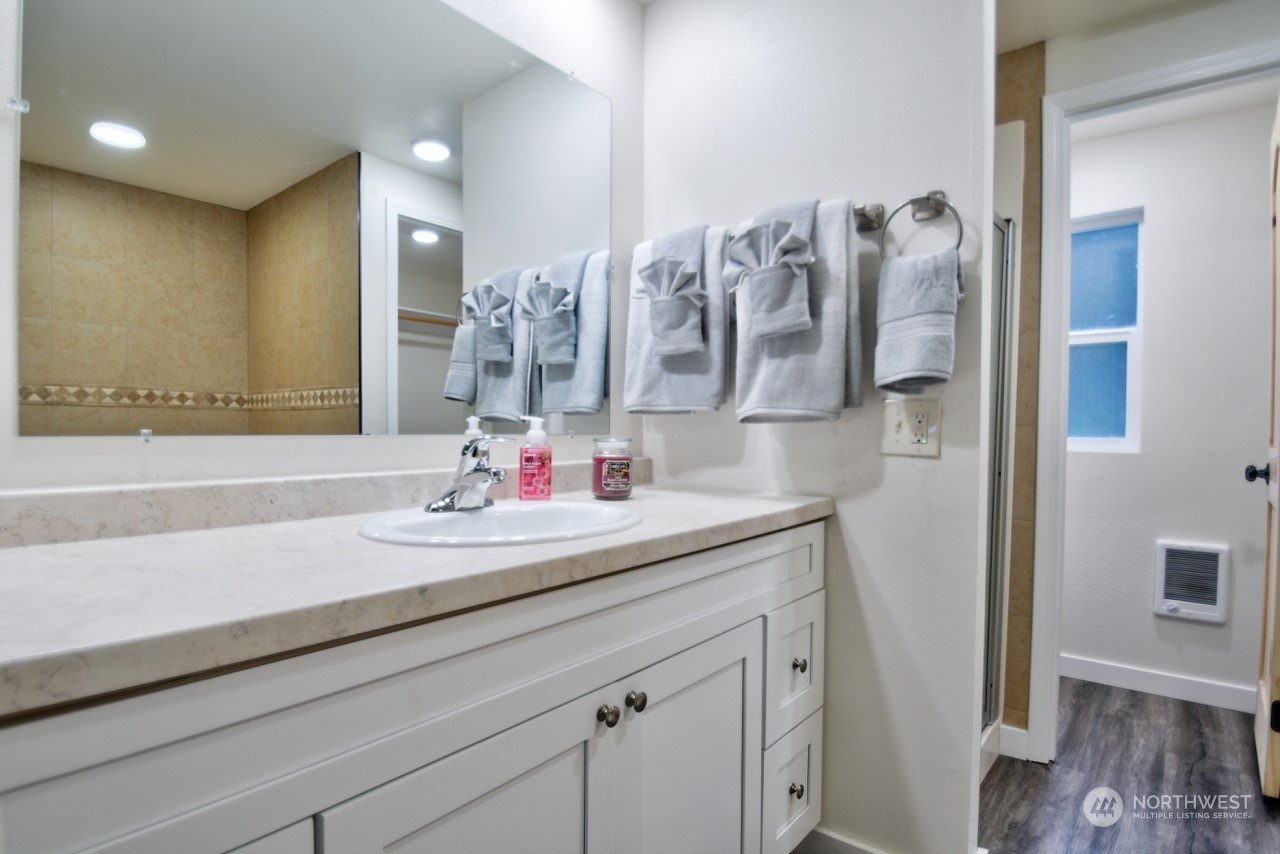 20020 Carper Road Southwest Rochester, WA 98579 - Photo 17 of 35 a bathroom with a sink and a mirror