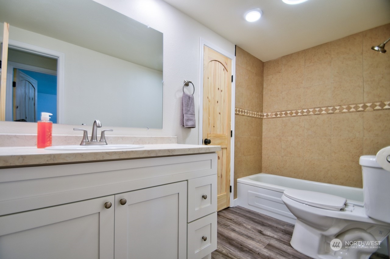 20020 Carper Road Southwest Rochester, WA 98579 - Photo 26 of 35 a bathroom with a sink a toilet and shower