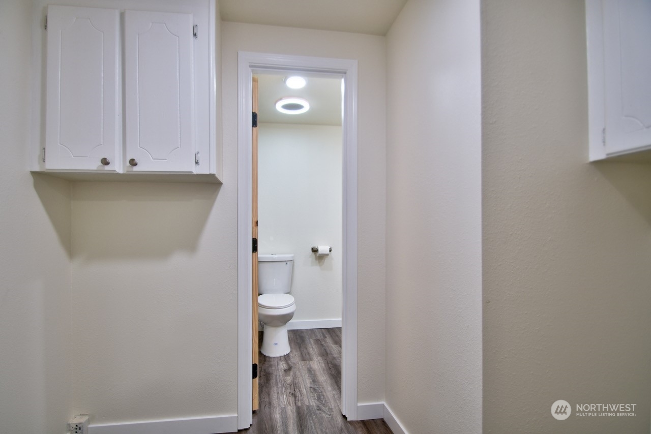 20020 Carper Road Southwest Rochester, WA 98579 - Photo 29 of 35 a bathroom with a toilet and a sink