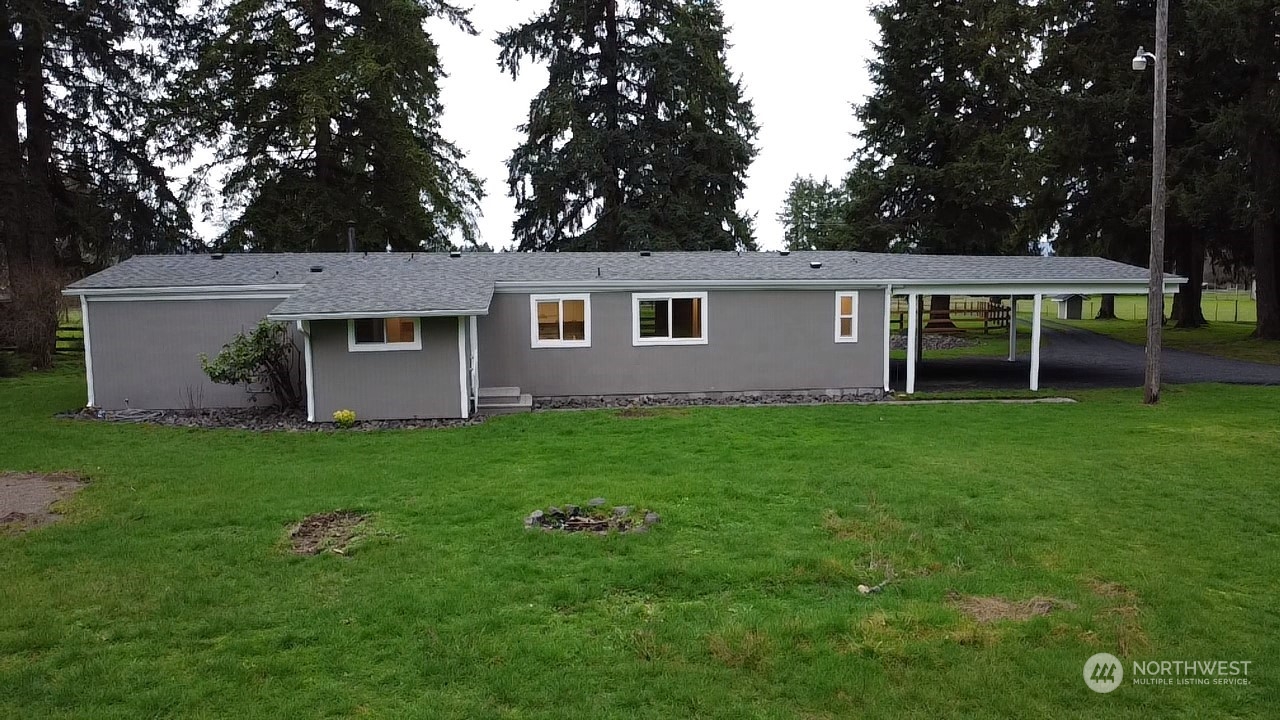 20020 Carper Road Southwest Rochester, WA 98579 - Photo 34 of 35 a front view of house with yard and green space