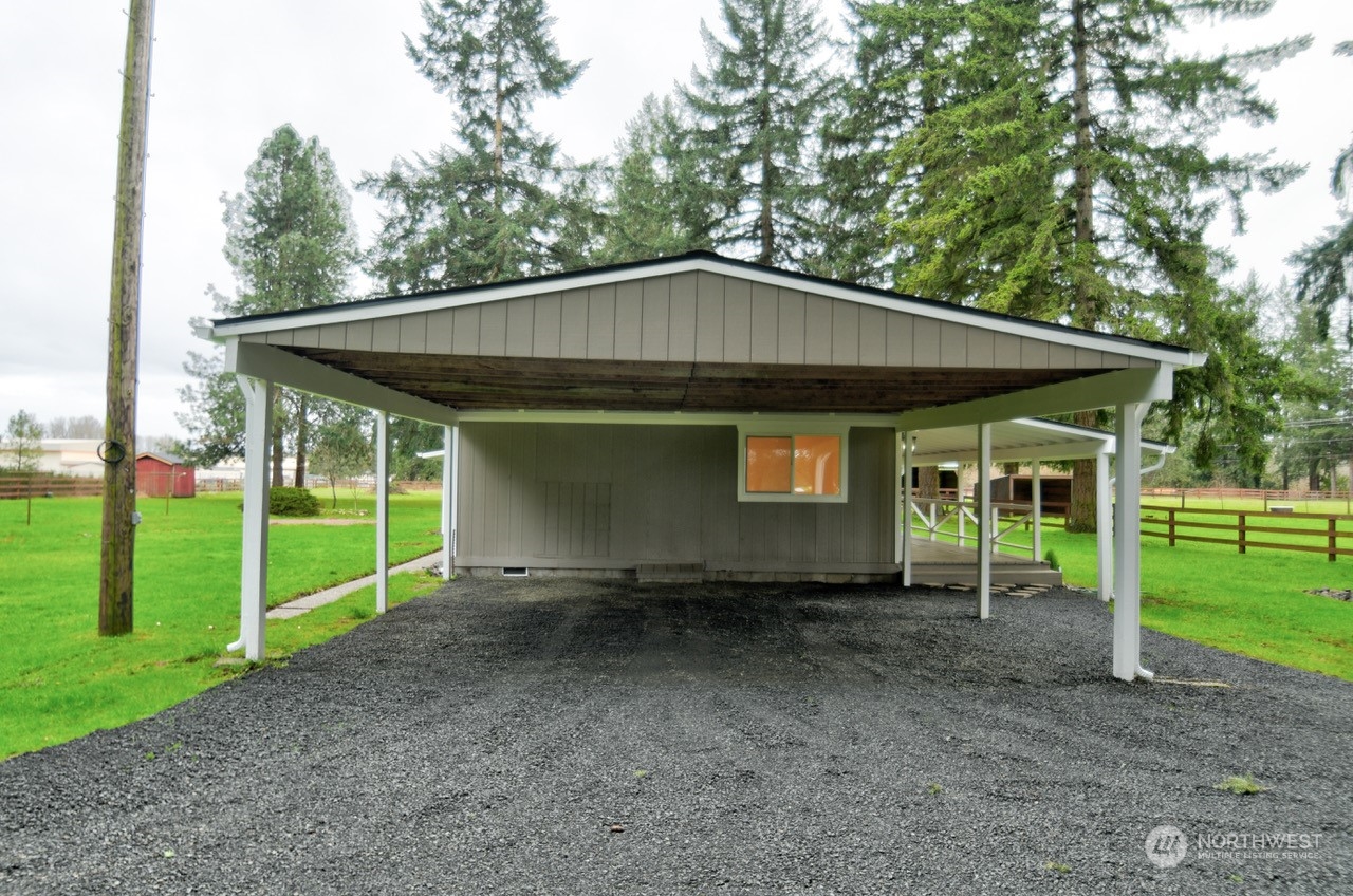 20020 Carper Road Southwest Rochester, WA 98579 - Photo 6 of 35 a front view of a house with garden