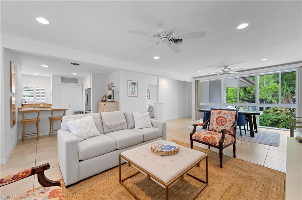 1340 Crayton Road, Unit 4 Naples, FL 34102 - Photo 15 of 22 Living area featuring light tile patterned flooring, recessed lighting, and ceiling fan