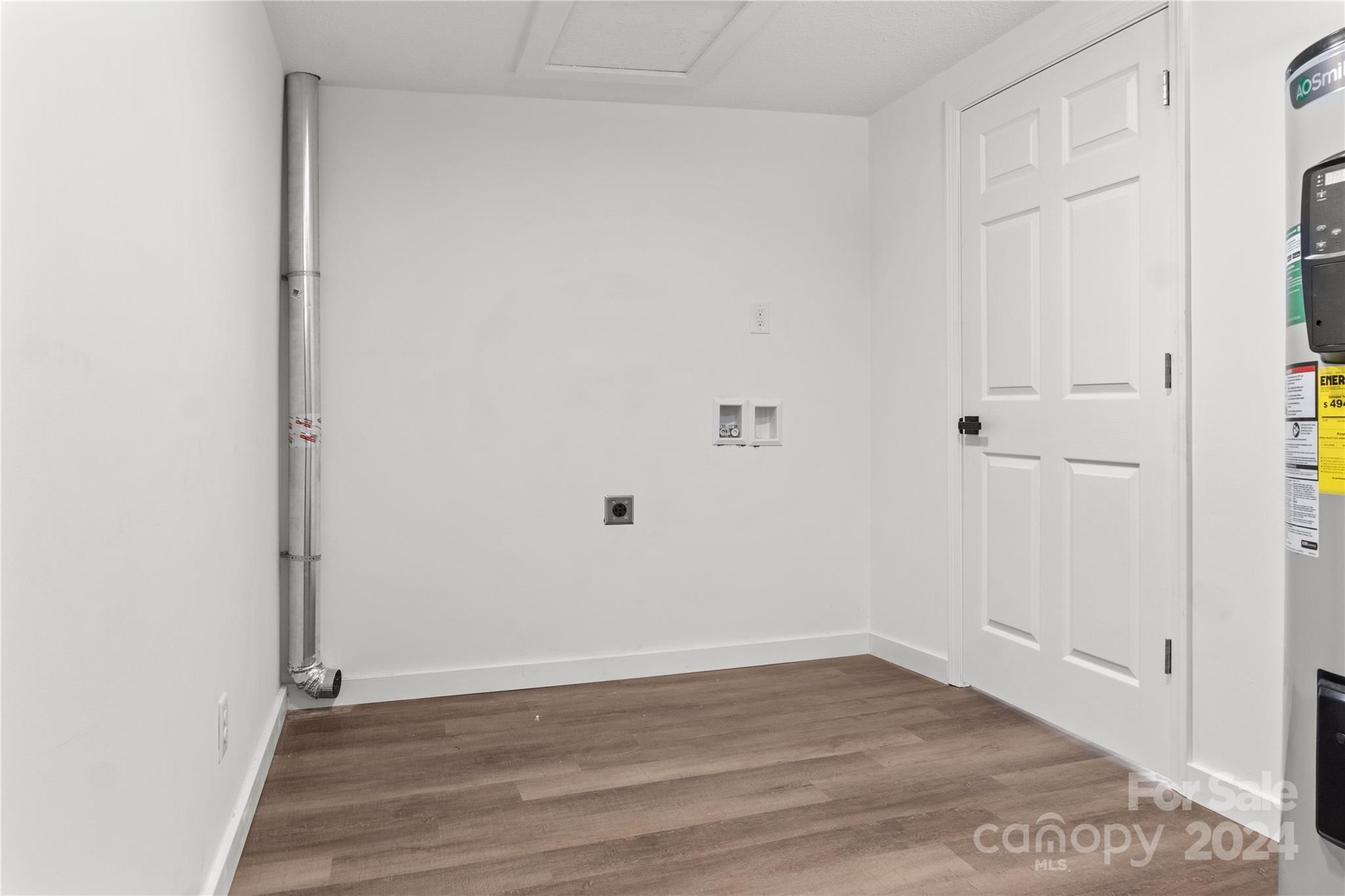 4879 Joe Powell Road Morganton, NC 28655 - Photo 23 of 35 a view of an empty room with wooden floor