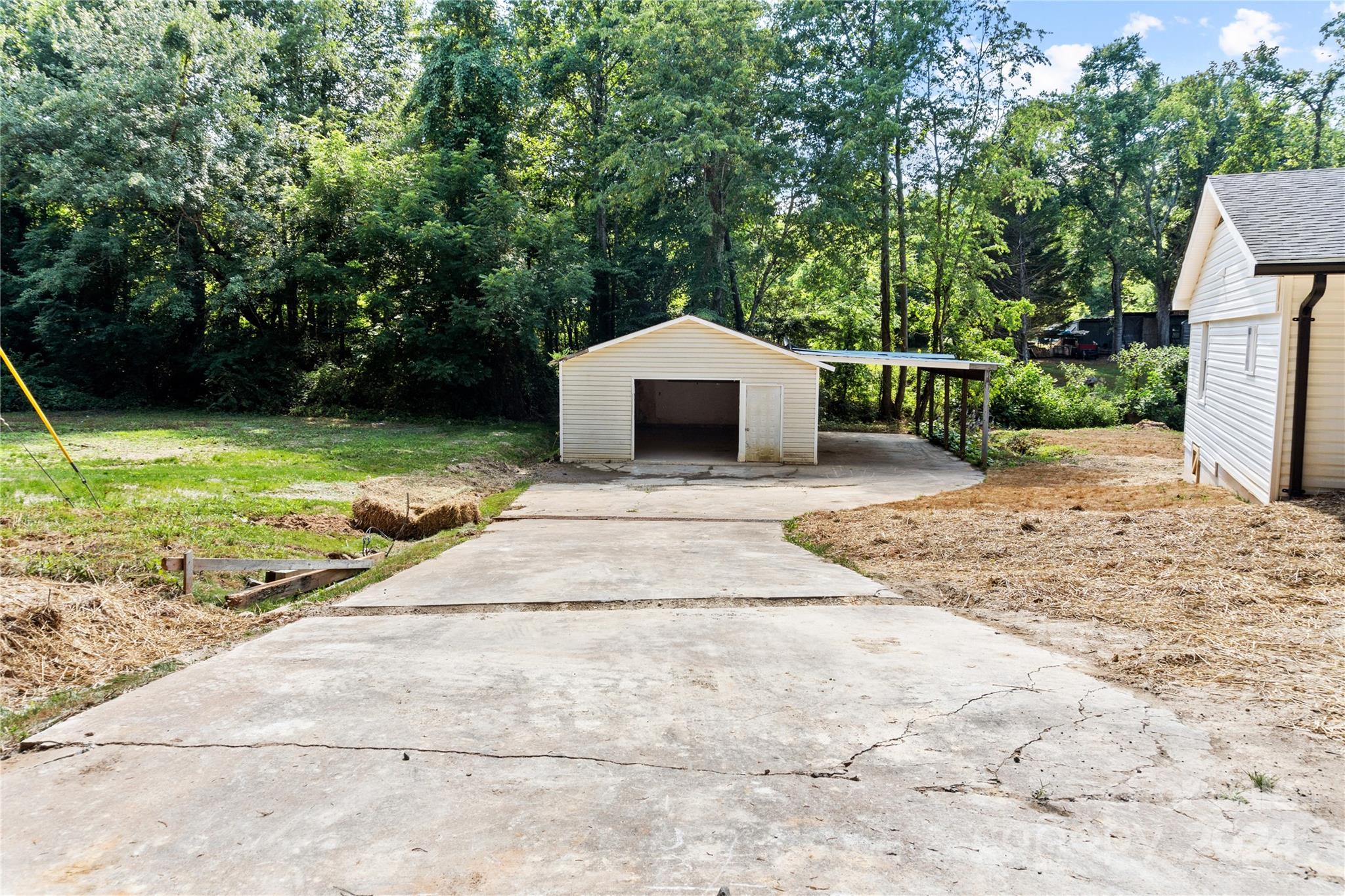 4879 Joe Powell Road Morganton, NC 28655 - Photo 34 of 35 a front view of a house with garden