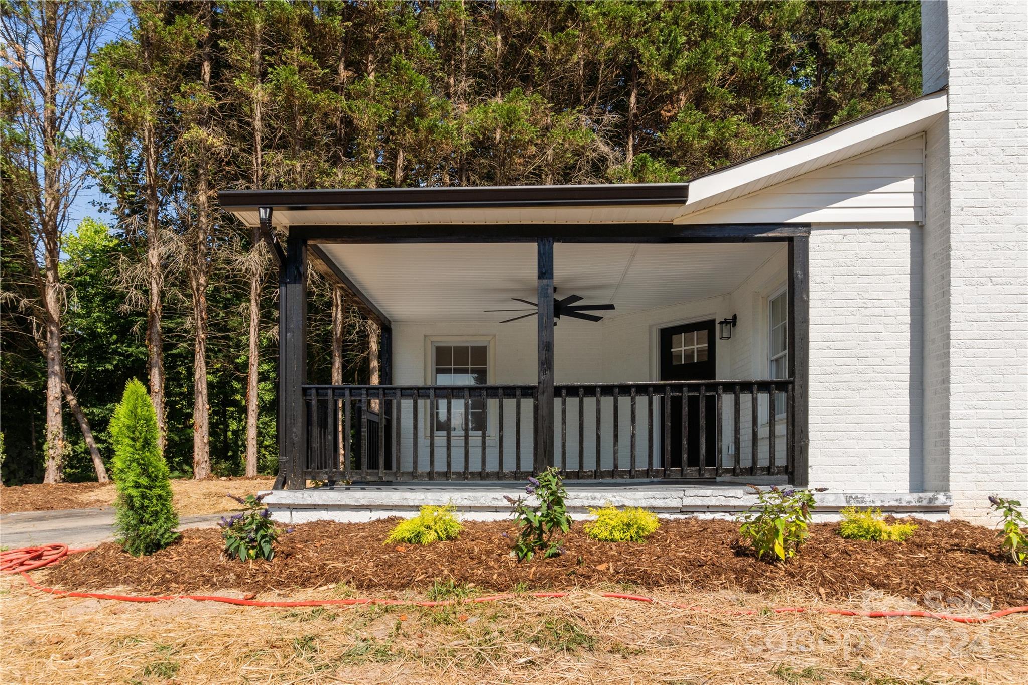 4879 Joe Powell Road Morganton, NC 28655 - Photo 4 of 35 a view of a patio with a fence