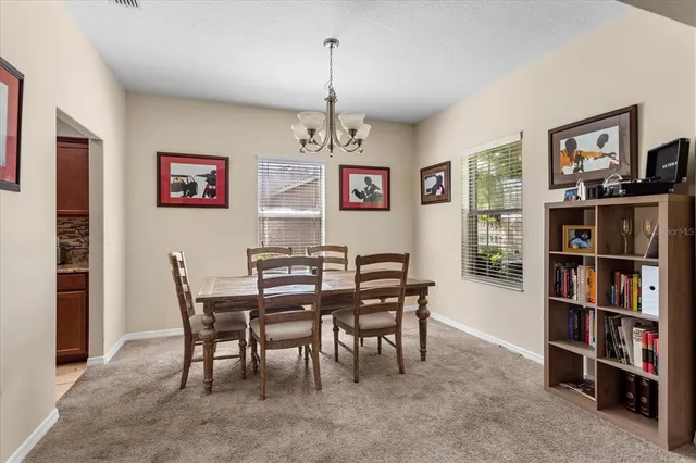a view of a dining room with furniture