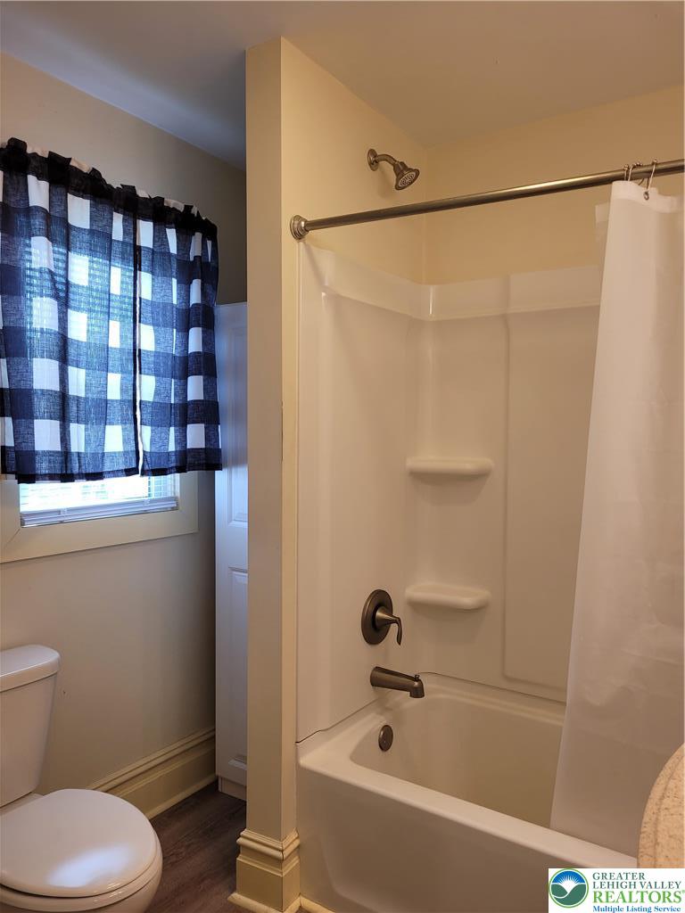 1024 Delaware Avenue, Unit 1 Bethlehem, PA 18015 - Photo 16 of 17 a bathroom with a shower and a toilet