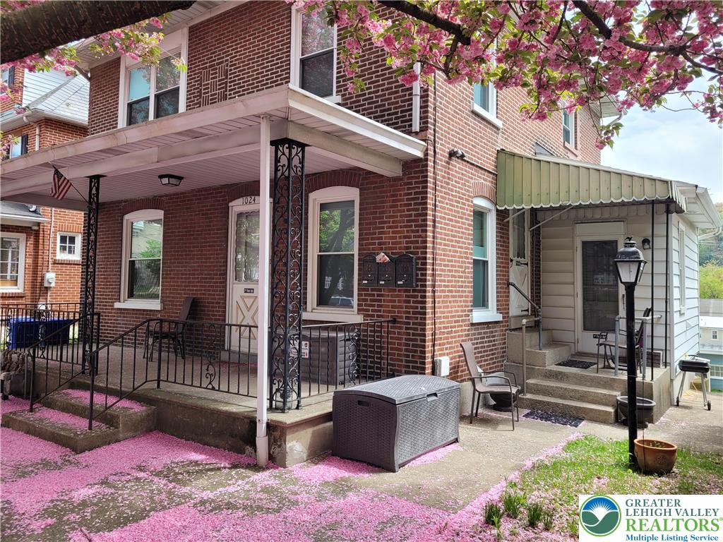 1024 Delaware Avenue, Unit 1 Bethlehem, PA 18015 - Photo 6 of 17 a front view of a house with outdoor seating