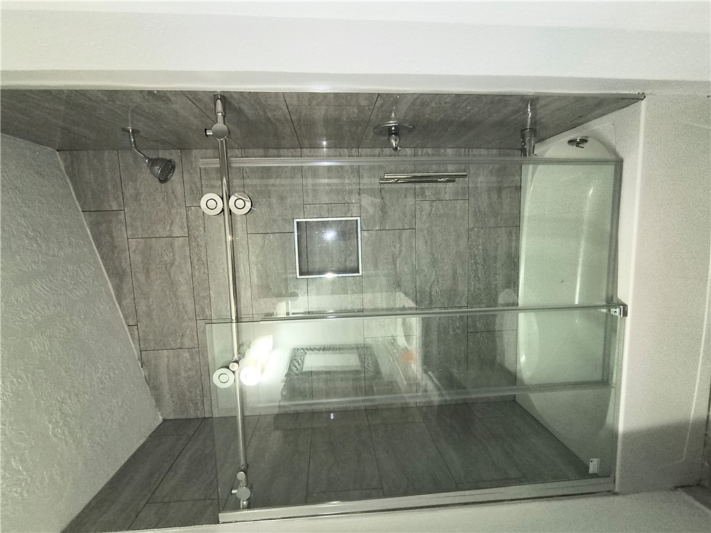 611 Wheelock Street Franklin, TX 77856 - Photo 8 of 8 a bathroom with a shower